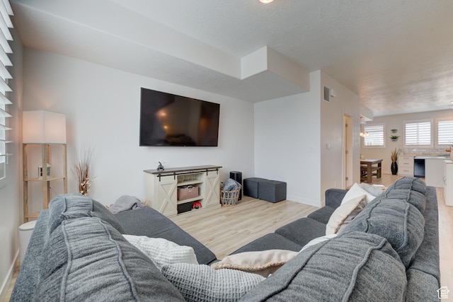 4696 W Talavera Way, Kearns, UT 84118 - living room featuring wood finished floors and baseboards