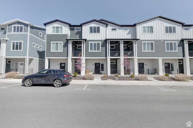 townhome / multi-family property featuring board and batten siding