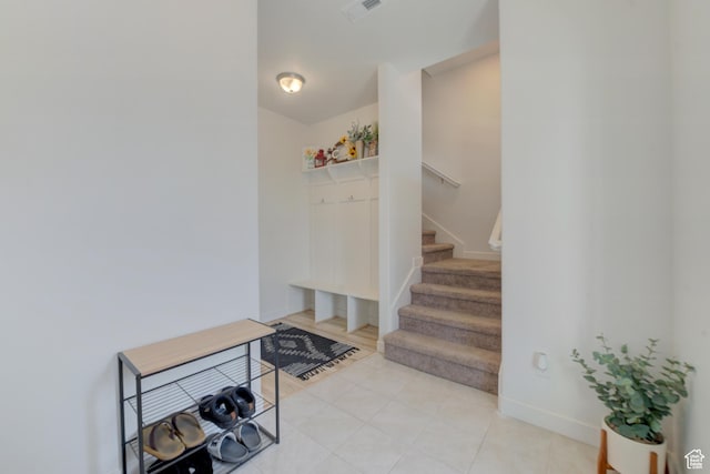 4696 W Talavera Way, Kearns, UT 84118 - entryway with stairs, visible vents, baseboards, and light tile patterned flooring