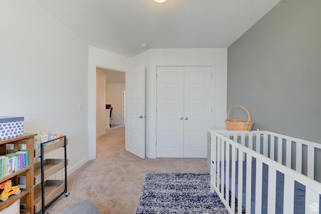 4696 W Talavera Way, Kearns, UT 84118 - bedroom with a closet, baseboards, a nursery area, and carpet floors