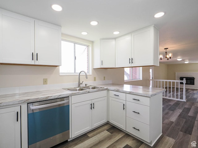 5085 Clover View Dr Unit 11, Murray, UT 84123 - kitchen featuring a sink, white cabinetry, and dishwashing machine