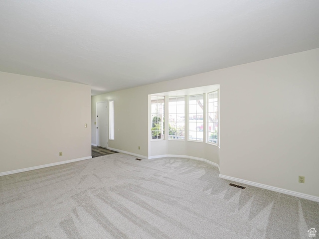 5085 Clover View Dr Unit 11, Murray, UT 84123 - carpeted empty room with visible vents and baseboards