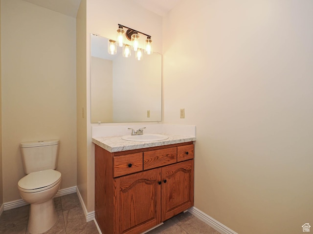 5085 Clover View Dr Unit 11, Murray, UT 84123 - bathroom with toilet, vanity, baseboards, and tile patterned flooring