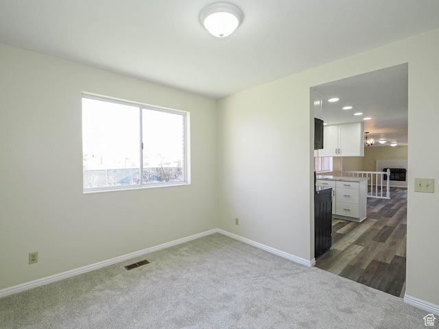 5085 Clover View Dr Unit 11, Murray, UT 84123 - empty room with visible vents, baseboards, recessed lighting, and dark colored carpet
