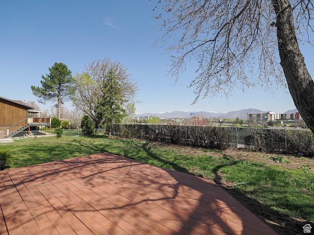 5085 Clover View Dr Unit 11, Murray, UT 84123 - wooden deck with a mountain view, a fenced backyard, and a lawn