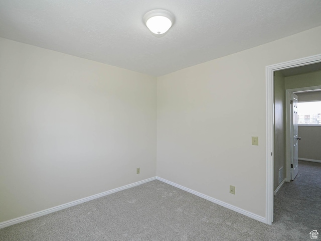 5085 Clover View Dr Unit 11, Murray, UT 84123 - carpeted empty room with baseboards and visible vents