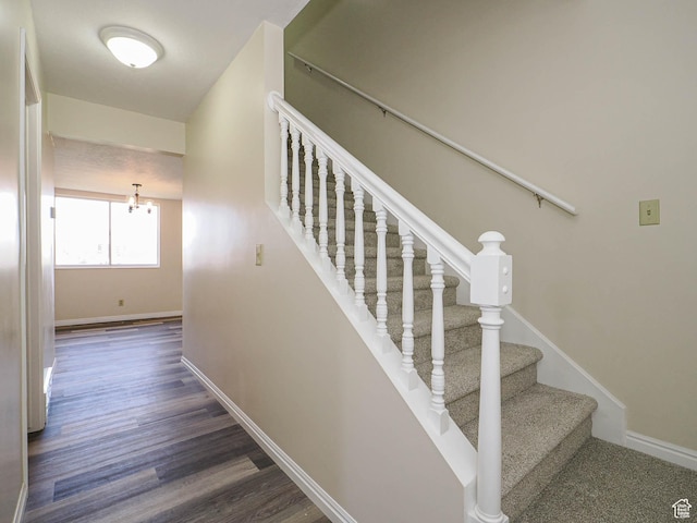 5085 Clover View Dr Unit 11, Murray, UT 84123 - stairway with baseboards, a notable chandelier, and wood finished floors