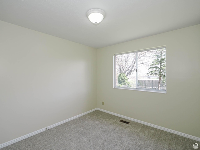 5085 Clover View Dr Unit 11, Murray, UT 84123 - unfurnished room featuring carpet, visible vents, and baseboards