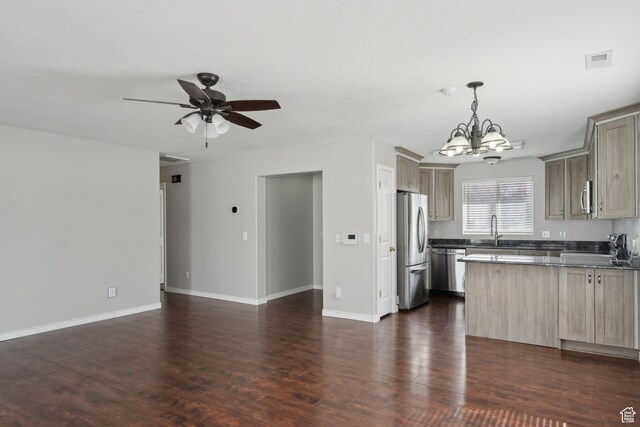 281 W Calias Ln, Stansbury Park, UT 84074 - kitchen with open floor plan, visible vents, appliances with stainless steel finishes, ceiling fan with notable chandelier, and a sink