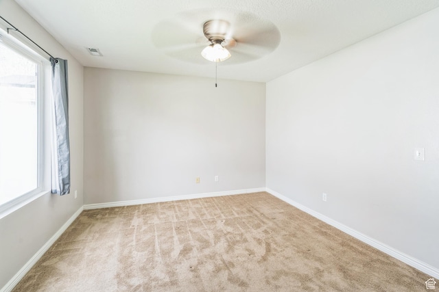 281 W Calias Ln, Stansbury Park, UT 84074 - unfurnished room with ceiling fan, baseboards, carpet flooring, and visible vents