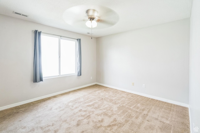 281 W Calias Ln, Stansbury Park, UT 84074 - carpeted empty room with baseboards, a ceiling fan, and visible vents