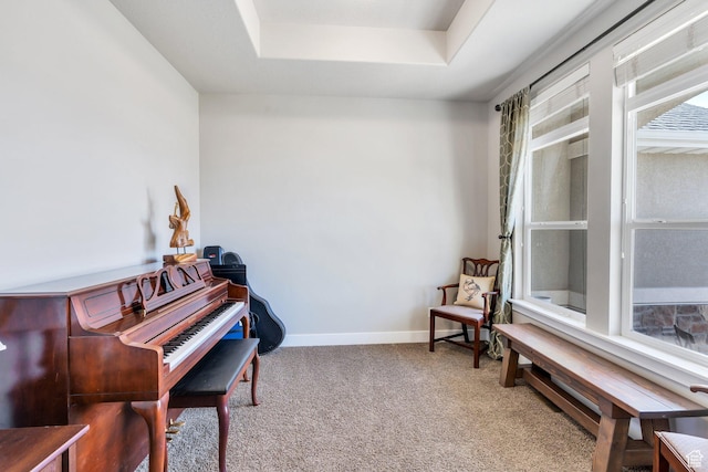 2155 E Blue Sky Dr, Eagle Mountain, UT 84005 - living area with a raised ceiling, baseboards, and carpet floors