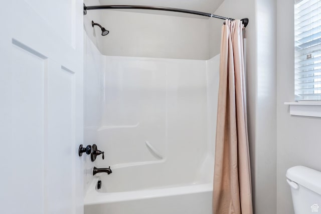 2155 E Blue Sky Dr, Eagle Mountain, UT 84005 - bathroom with toilet and shower / bath combination with curtain