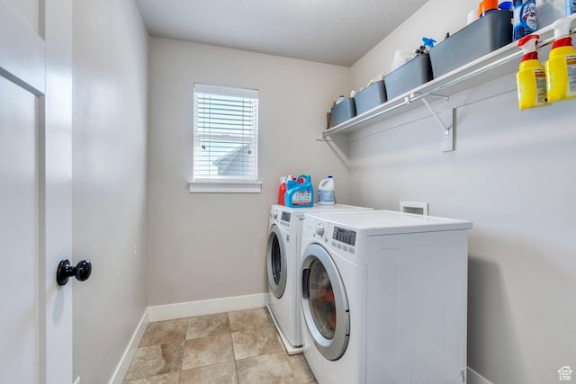2155 E Blue Sky Dr, Eagle Mountain, UT 84005 - laundry area featuring baseboards, separate washer and dryer, and laundry area