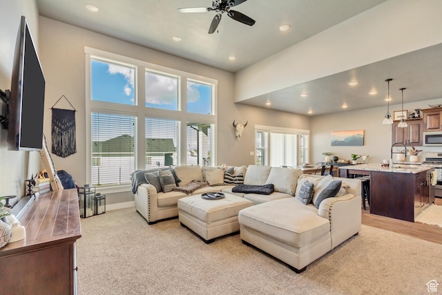 542 W Coyote Ridge Rd Unit 20, Grantsville, UT 84029 - living area with baseboards, a ceiling fan, and recessed lighting