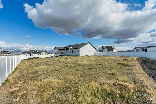 542 W Coyote Ridge Rd Unit 20, Grantsville, UT 84029 - view of yard with a residential view and a fenced backyard