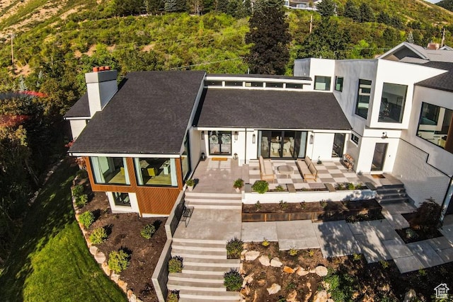 4155 S Parkview Dr, Salt Lake City, UT 84124 - rear view of property featuring a shingled roof and stairs