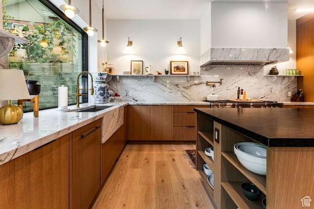 4155 S Parkview Dr, Salt Lake City, UT 84124 - kitchen featuring a sink, range hood, brown cabinetry, and open shelves