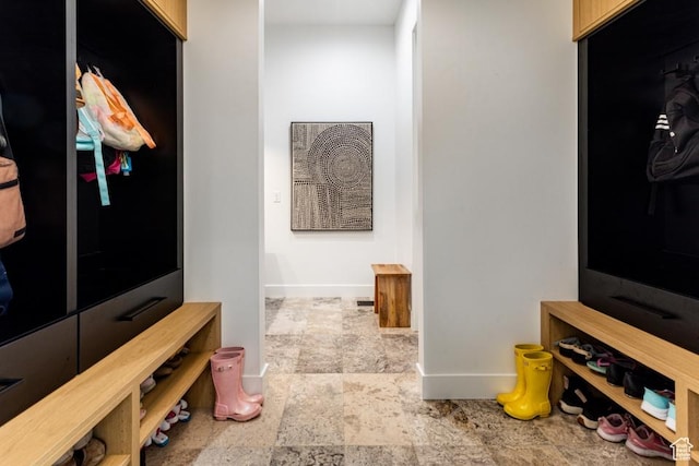 4155 S Parkview Dr, Salt Lake City, UT 84124 - mudroom featuring stone tile floors and baseboards