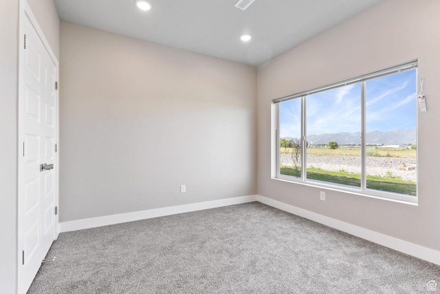 632 E 730 N, Hyrum, UT 84319 - carpeted empty room with a mountain view, baseboards, and recessed lighting