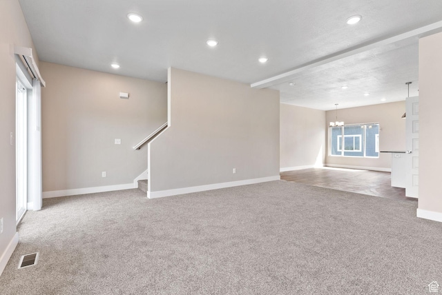 632 E 730 N, Hyrum, UT 84319 - unfurnished living room featuring a notable chandelier, baseboards, recessed lighting, carpet floors, and visible vents