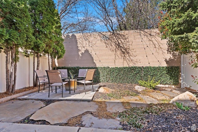 view of patio featuring a fenced backyard
