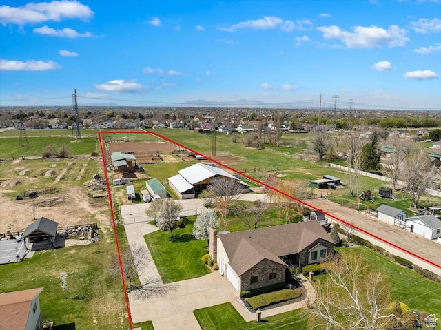 birds eye view of property with a residential view