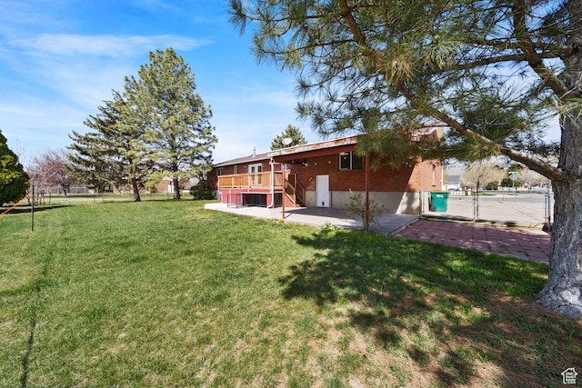 view of yard with a patio area and fence