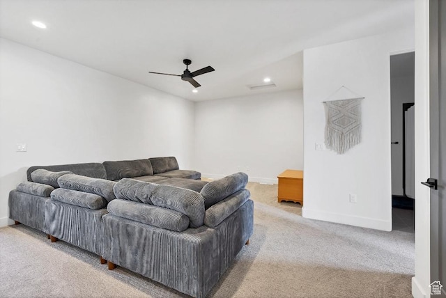 carpeted living room with baseboards, recessed lighting, and a ceiling fan