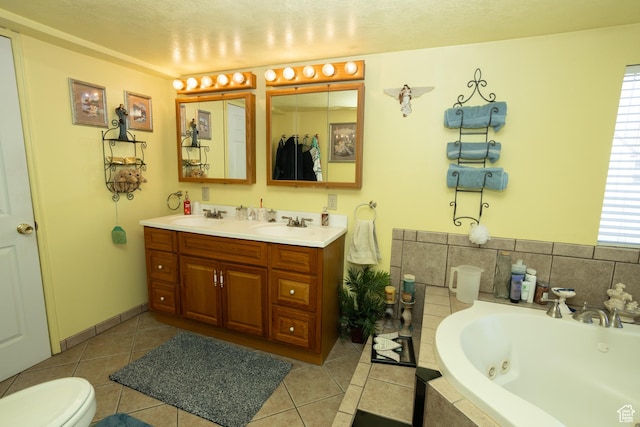 145 S 100 E, Redmond, UT 84652 - full bathroom featuring a whirlpool tub, tile patterned flooring, double vanity, and a sink