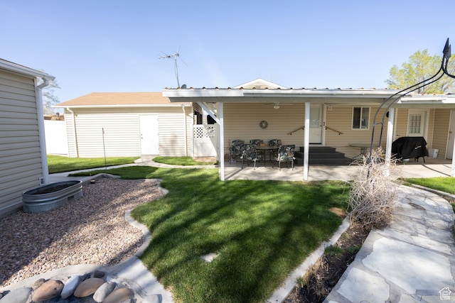 145 S 100 E, Redmond, UT 84652 - rear view of house featuring entry steps, a yard, and a patio area