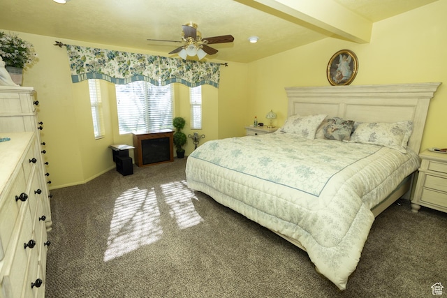 145 S 100 E, Redmond, UT 84652 - bedroom featuring beam ceiling, ceiling fan, carpet, and baseboards