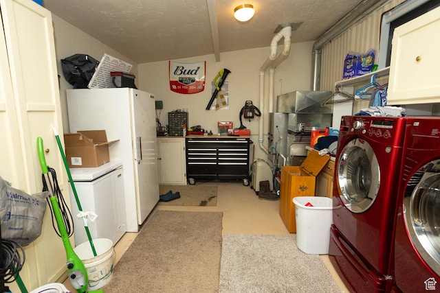 145 S 100 E, Redmond, UT 84652 - laundry room with cabinet space and washer and clothes dryer