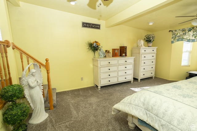 145 S 100 E, Redmond, UT 84652 - bedroom with dark carpet, ceiling fan, baseboards, and beamed ceiling