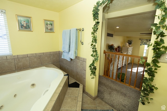 145 S 100 E, Redmond, UT 84652 - full bathroom featuring tile patterned floors, baseboards, and a tub with jets