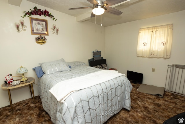 145 S 100 E, Redmond, UT 84652 - carpeted bedroom featuring radiator heating unit and a ceiling fan