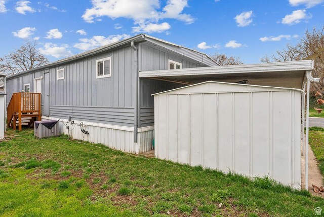 5100 S 1050 W Unit H138, Riverdale, UT 84405 - exterior space with a yard, a storage shed, and an outdoor structure
