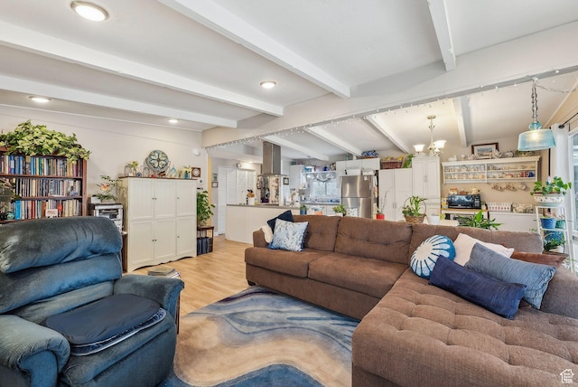 5100 S 1050 W Unit H138, Riverdale, UT 84405 - living area with beamed ceiling, recessed lighting, an inviting chandelier, and light wood-style floors