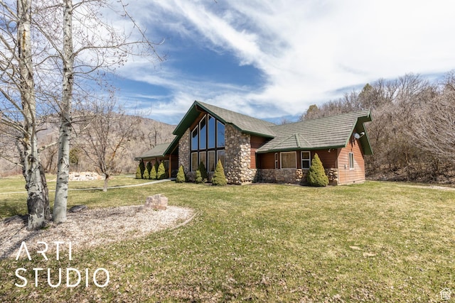 260 S 10450 E, Huntsville, UT 84317 - view of side of home with stone siding and a lawn