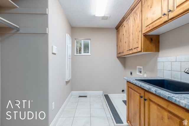 260 S 10450 E, Huntsville, UT 84317 - washroom featuring light tile patterned floors, visible vents, washer hookup, a sink, and cabinet space