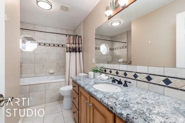 260 S 10450 E, Huntsville, UT 84317 - full bath featuring vanity, tile patterned flooring, visible vents, toilet, and decorative backsplash