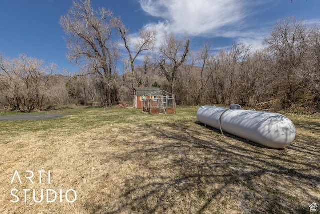 260 S 10450 E, Huntsville, UT 84317 - view of yard with an outbuilding and a forest view