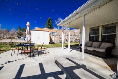 48 E 2nd N, Manila, UT 84046 - view of patio with an outdoor living space, outdoor dining space, and an outdoor structure