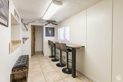 48 E 2nd N, Manila, UT 84046 - corridor with baseboards and light tile patterned flooring