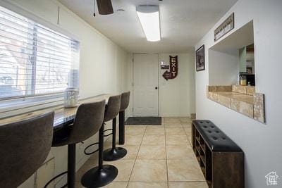 48 E 2nd N, Manila, UT 84046 - dining space with light tile patterned floors and a ceiling fan