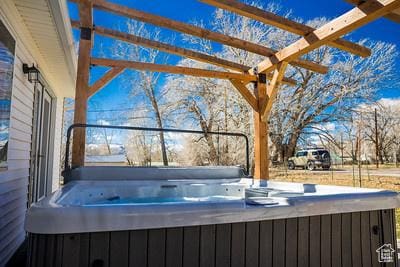 48 E 2nd N, Manila, UT 84046 - view of patio / terrace featuring a hot tub