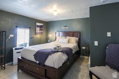 48 E 2nd N, Manila, UT 84046 - bedroom with light wood-style flooring and baseboards