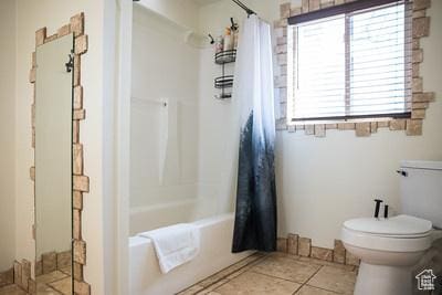 48 E 2nd N, Manila, UT 84046 - bathroom with tile patterned floors, shower / tub combo, and toilet