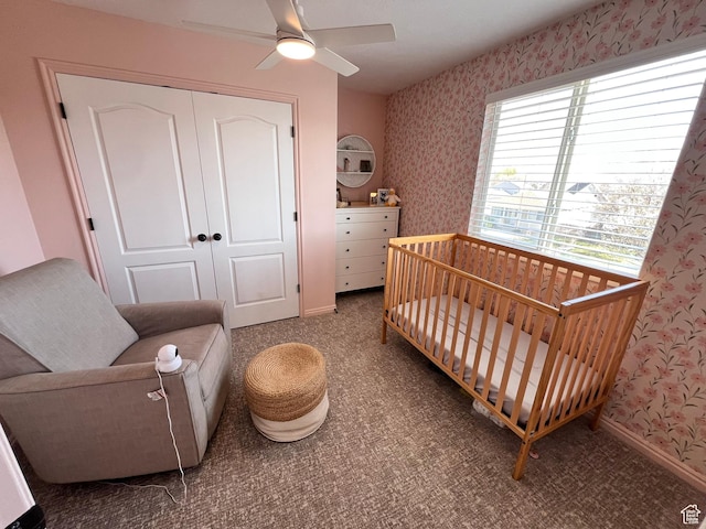 7777 N Mountain Ash Way, Eagle Mountain, UT 84005 - carpeted bedroom featuring a nursery area, a closet, baseboards, and wallpapered walls