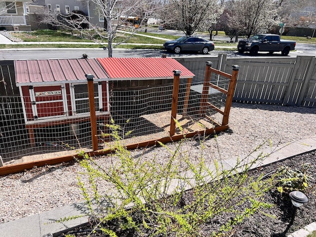 7777 N Mountain Ash Way, Eagle Mountain, UT 84005 - exterior space featuring exterior structure, fence, and an outdoor structure